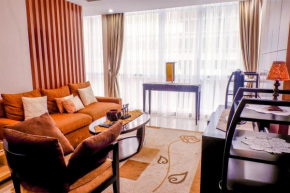 2BR Apartment Cozy Pool View Kemang Village with Access to Mall By Travelio